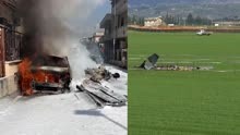 意大利空军两架飞机训练时在空中相撞 坠机引燃街道汽车黑烟滚滚
